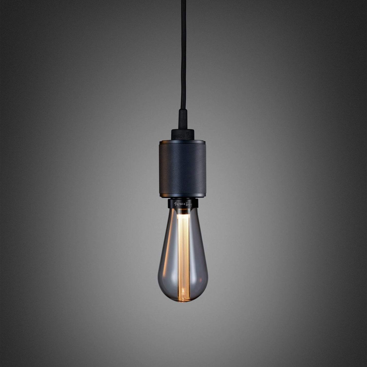 Heavy Metal Pendant light / Cross smoked bronze, front view.