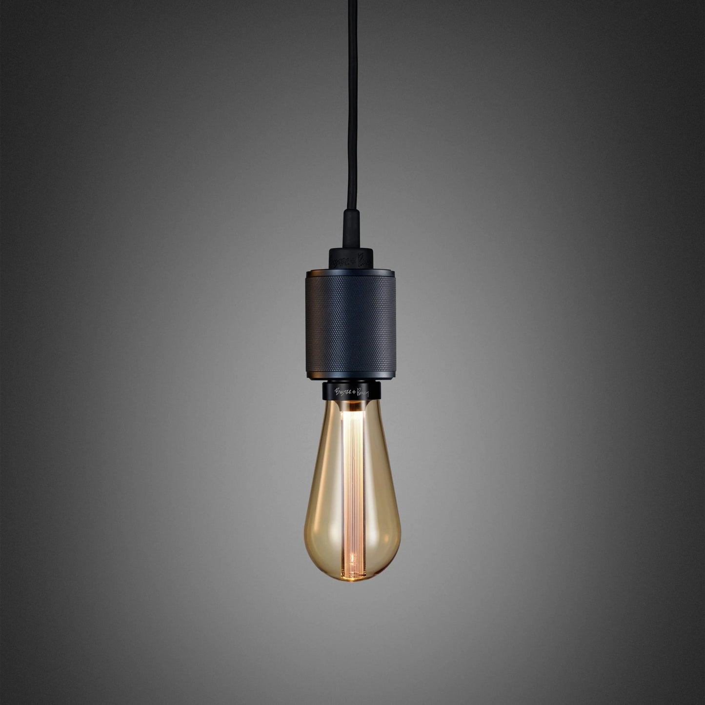 Heavy Metal Pendant light / Cross smoked bronze, front view.