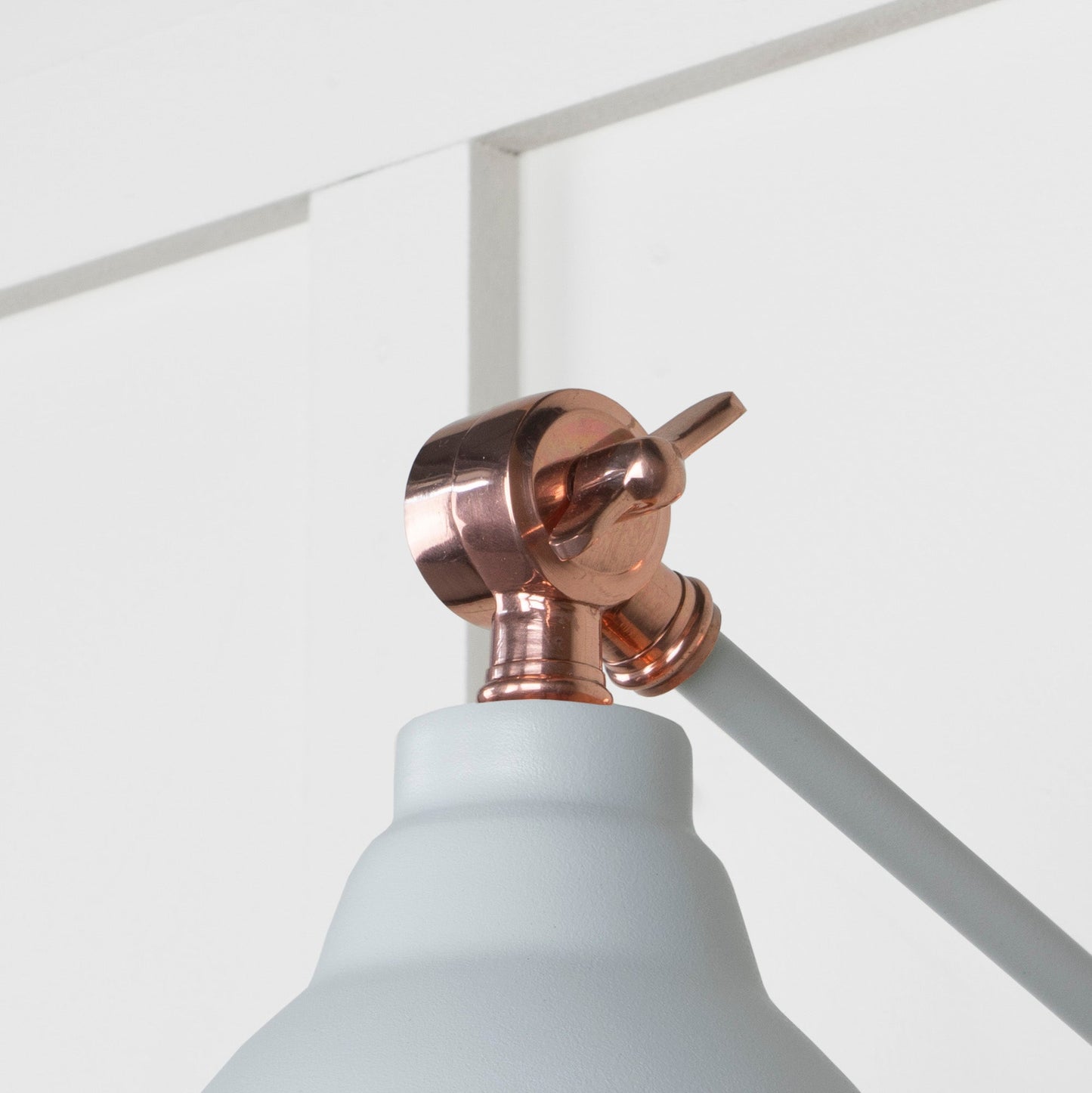 Smooth Copper Brindley Wall Light Birch, Detailed close up view of pendant.