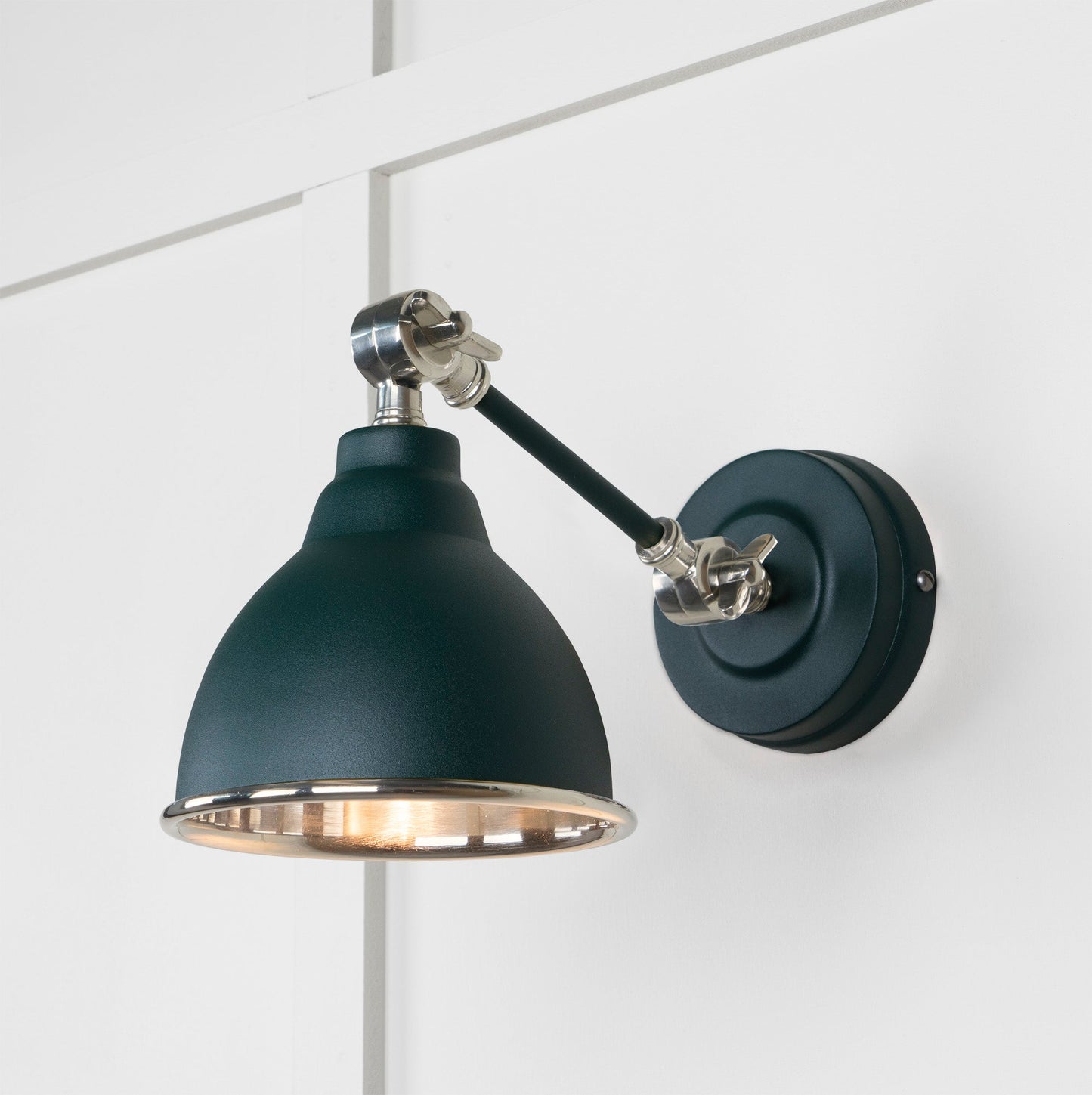 Smooth Nickel Brindley Wall Light Dingle, Front Side with light on.