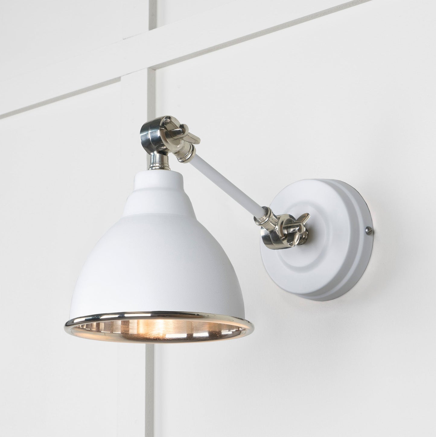 Smooth Nickel Brindley Wall Light Flock, Front Side with light on.