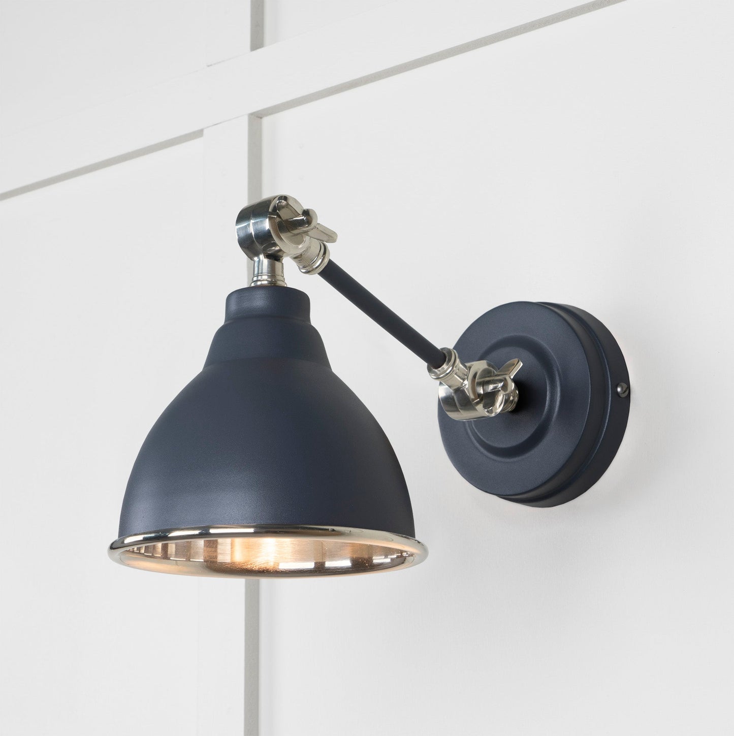 Smooth Nickel Brindley Wall Light Slate, Front Side with light on.