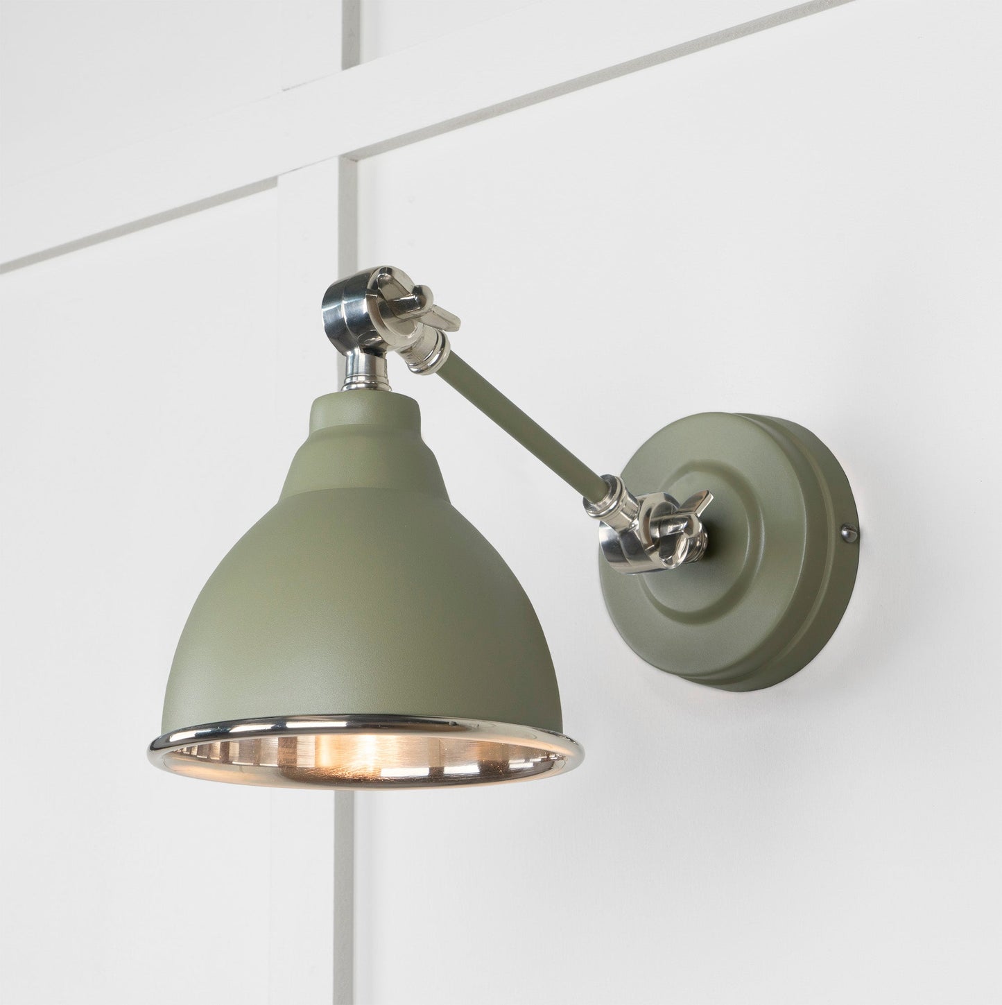 Smooth Nickel Brindley Wall Light Tump, Front Side with light on.