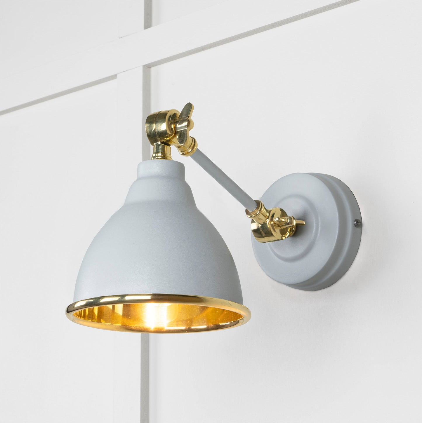 Smooth Brass Brindley Wall Light Birch, Front Side with light on.