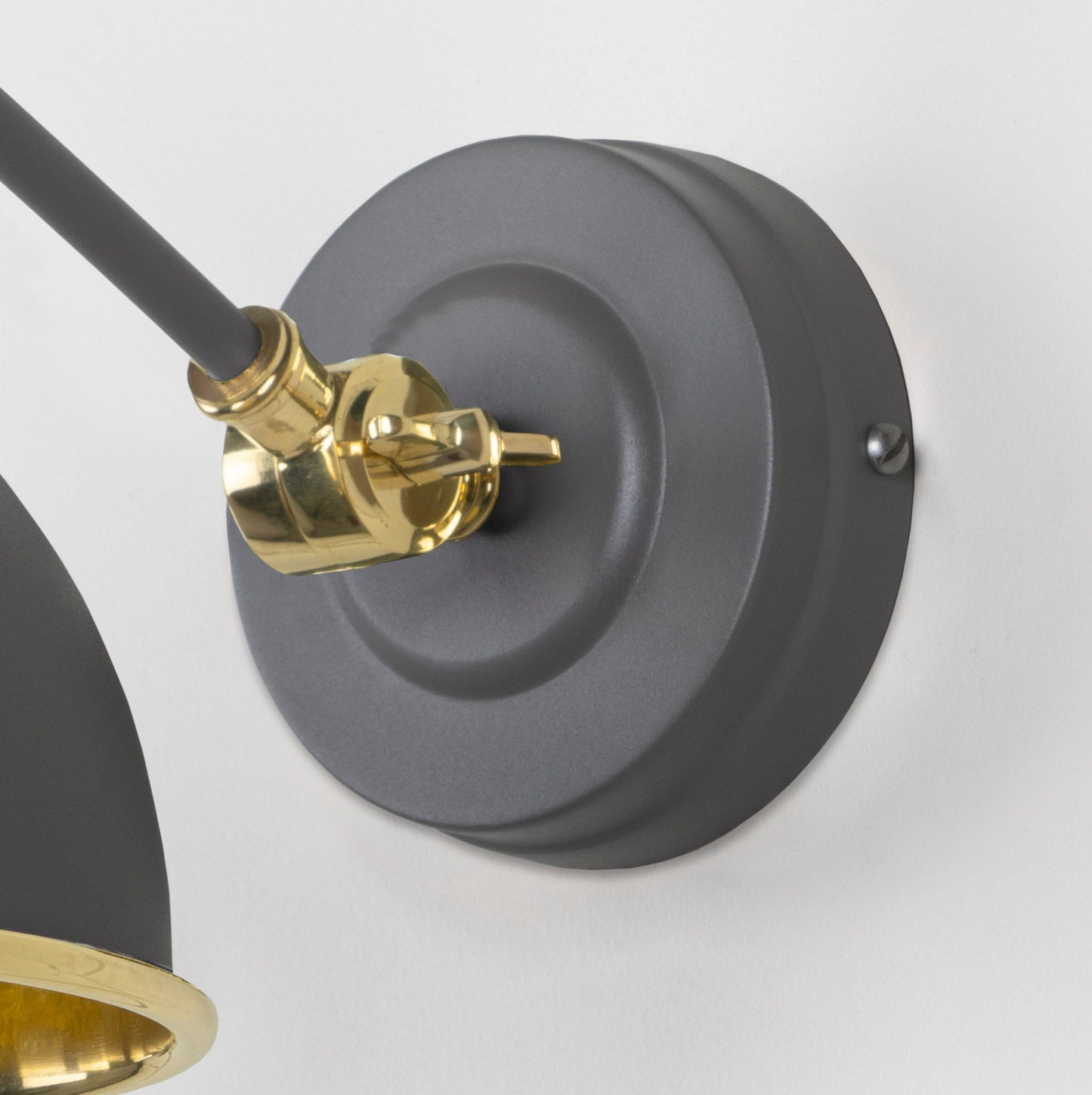 Smooth Brass Brindley Wall Light Bluff, close up view of fitting and cable.