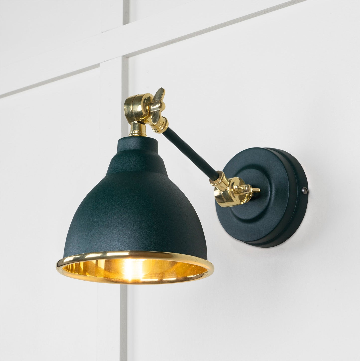 Smooth Brass Brindley Wall Light Dingle, Front Side with light on.