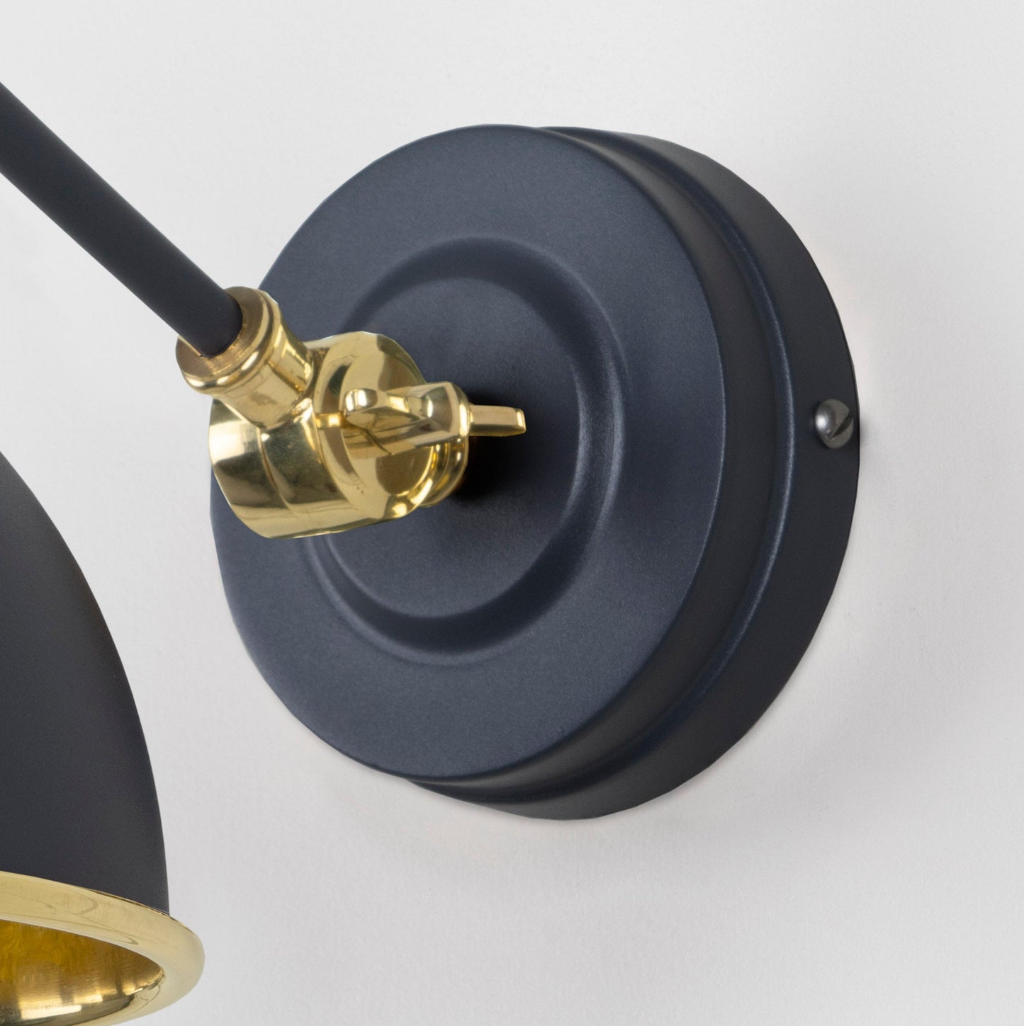 Smooth Brass Brindley Wall Light Slate, close up view of fitting and cable.