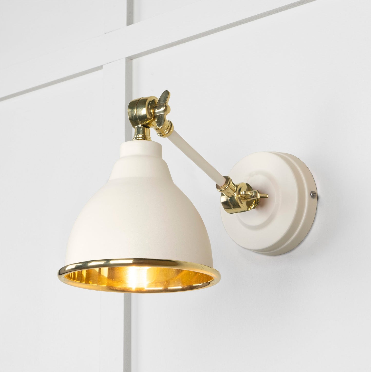 Smooth Brass Brindley Wall Light Teasel, Front Side with light on.