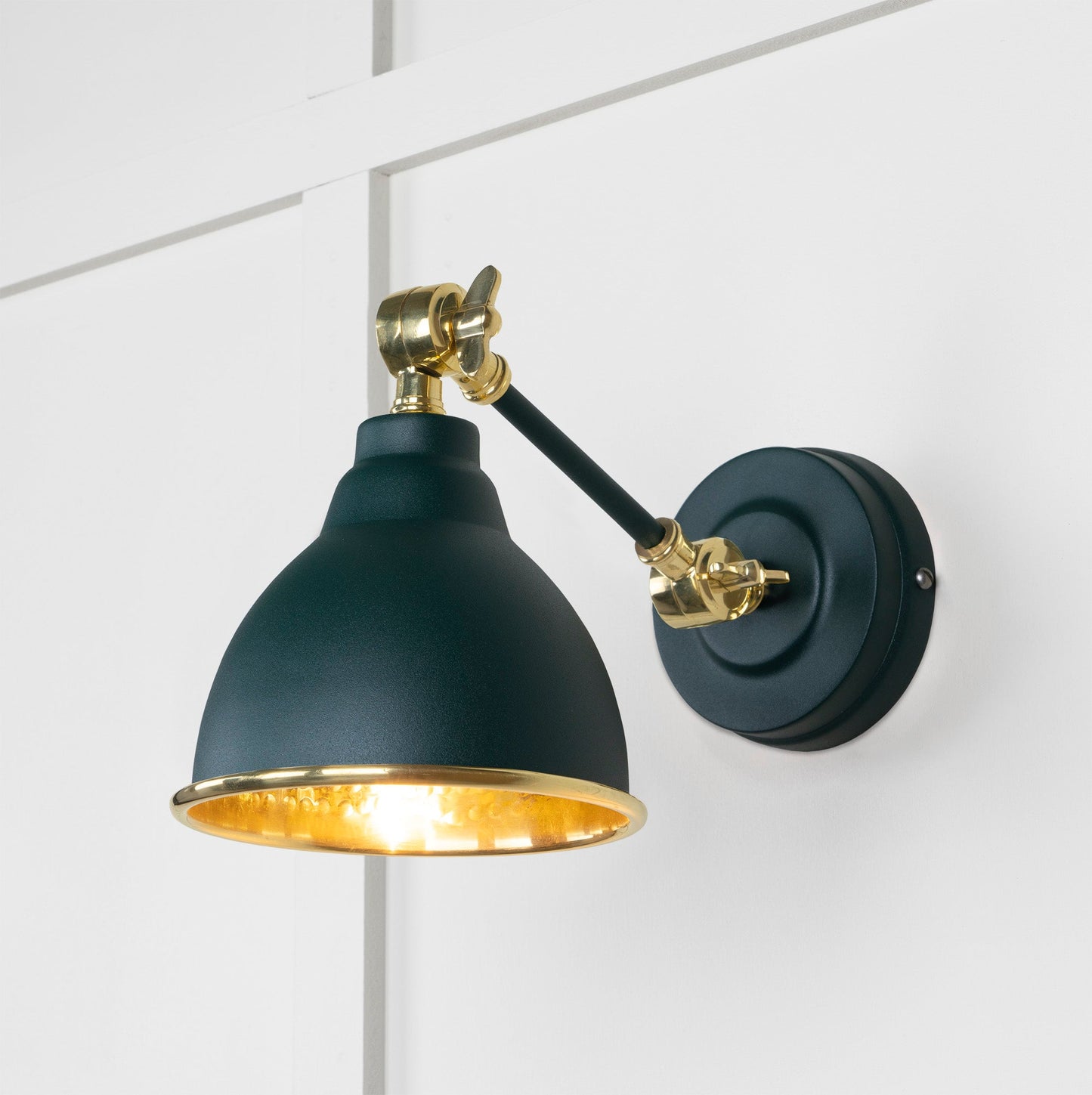 Hammered Brass Brindley Wall Light Dingle, Front Side with light on.