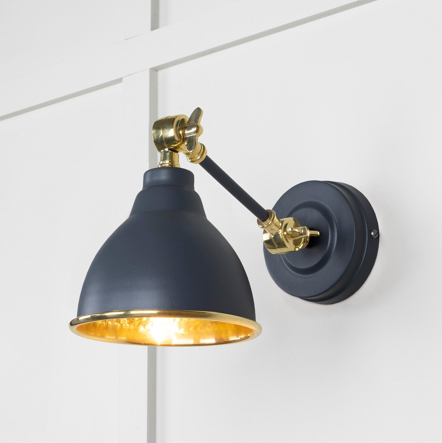 Hammered Brass Brindley Wall Light Slate, Front Side with light on.