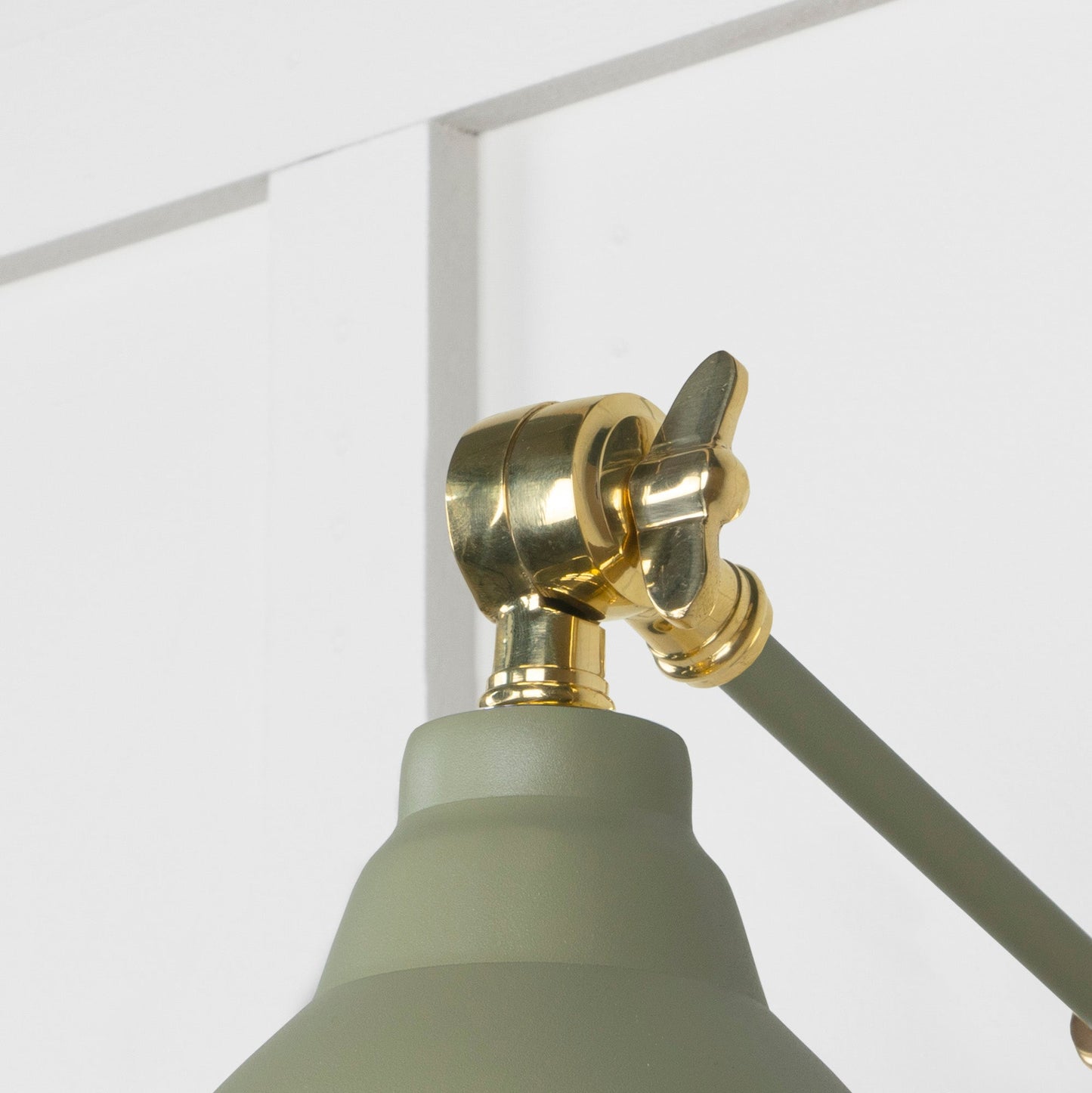 Hammered Brass Brindley Wall Light Tump, Detailed close up view of pendant.