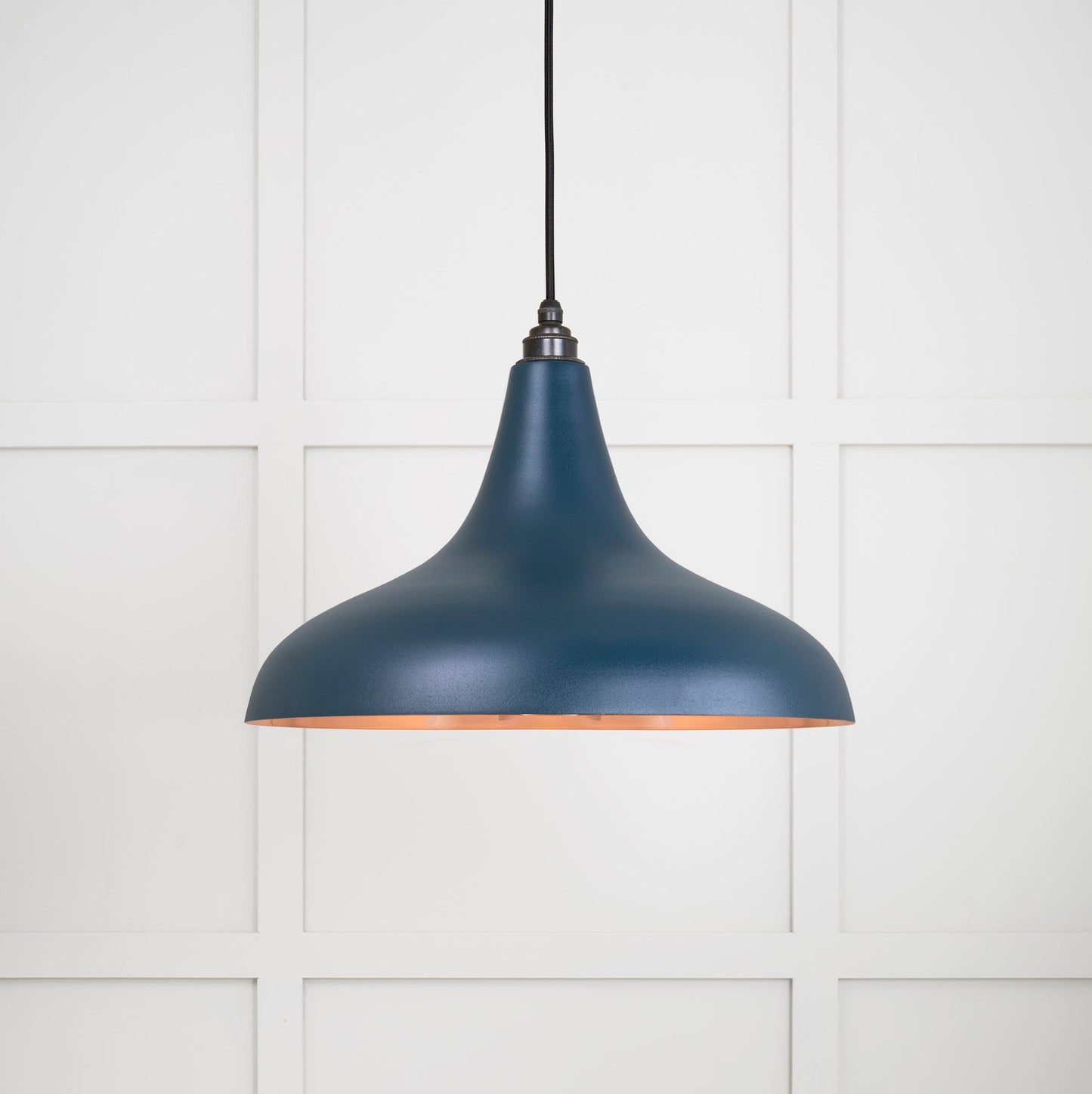Smooth Copper Frankley Pendant Light Dusk, Front Side with light on.