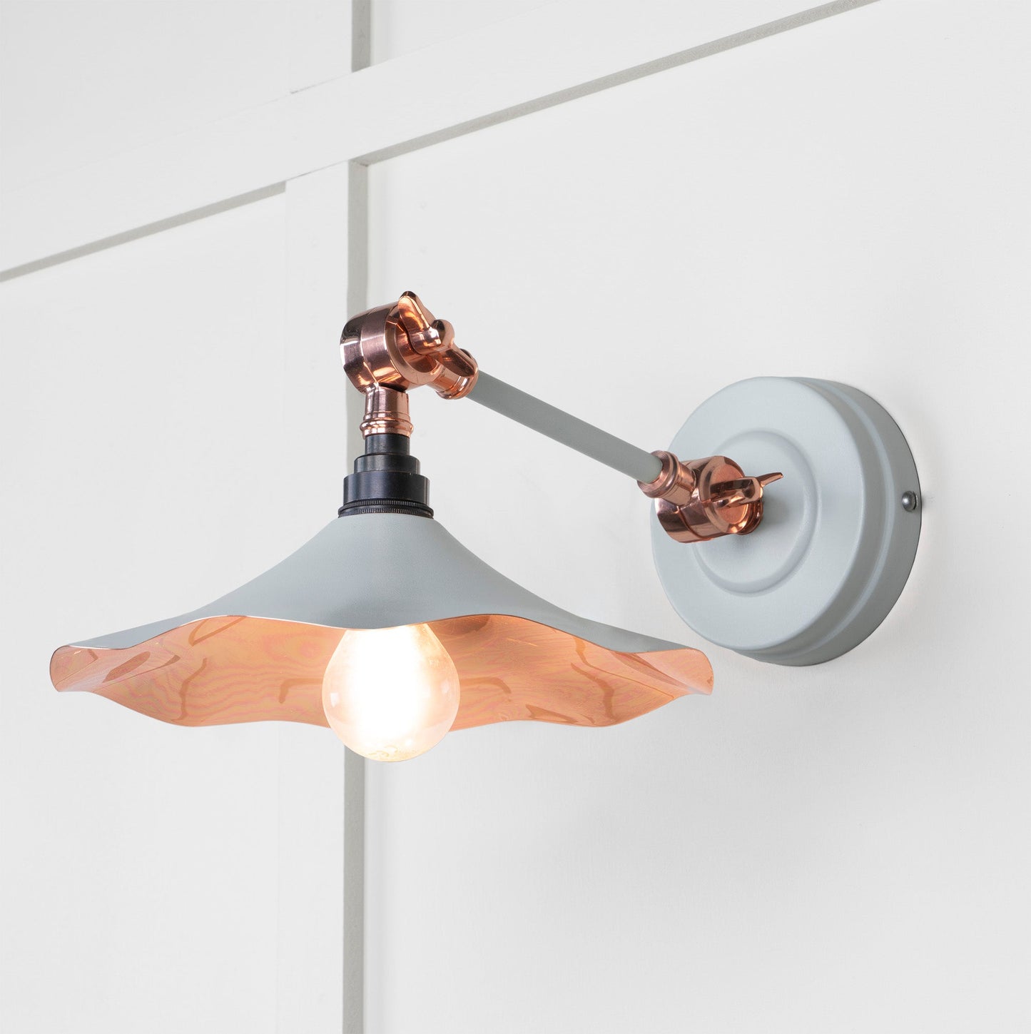 Smooth Copper Flora Wall Light Birch, Front Side with light on.