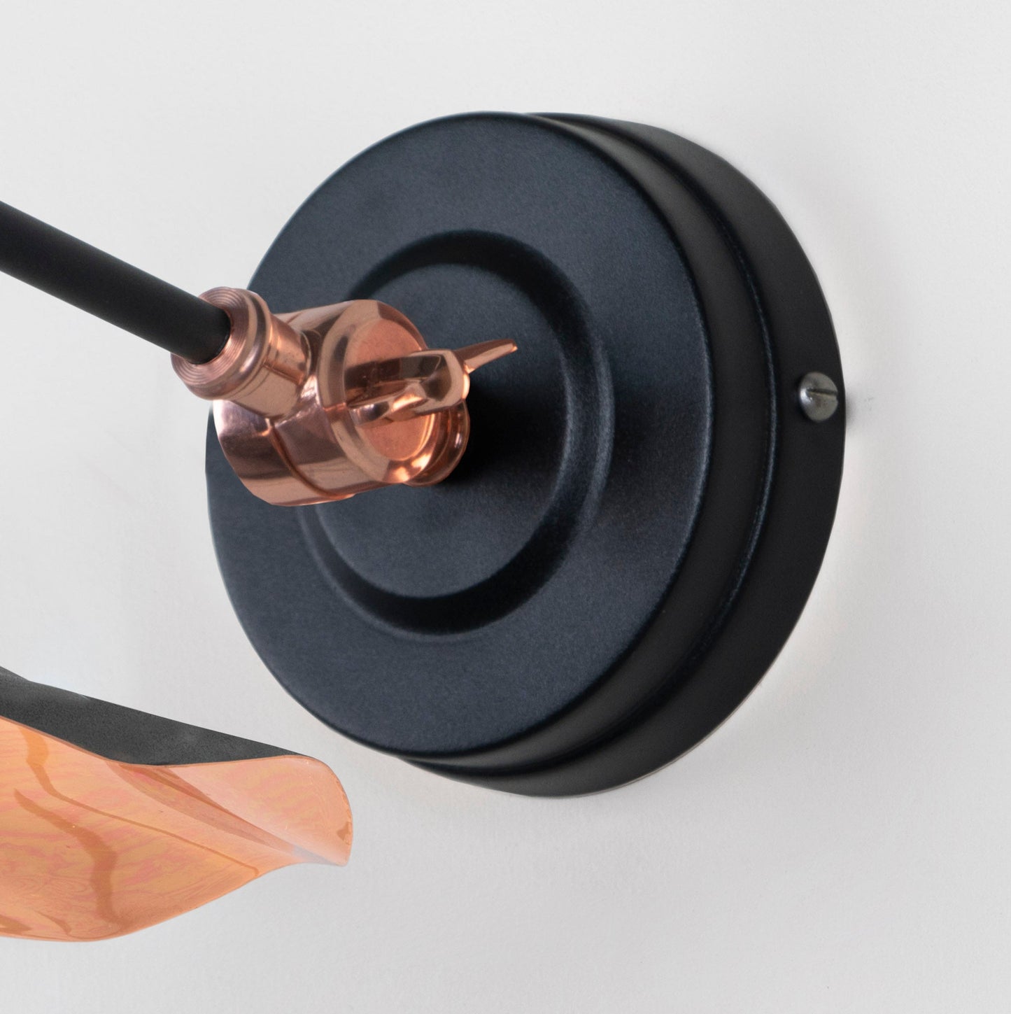 Smooth Copper Flora Wall Light Elan Black, close up view of fitting and cable.