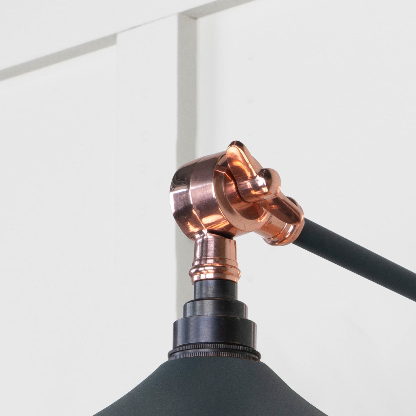 Smooth Copper Flora Wall Light Soot, Detailed close up view of pendant.