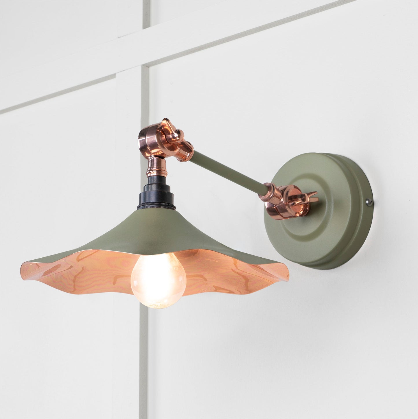 Smooth Copper Flora Wall Light Tump, Front Side with light on.
