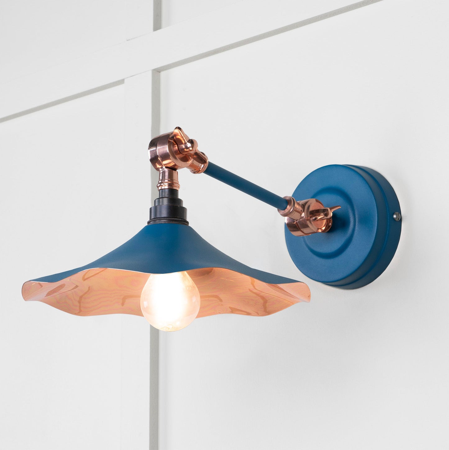Smooth Copper Flora Wall Light Upstream, Front Side with light on.