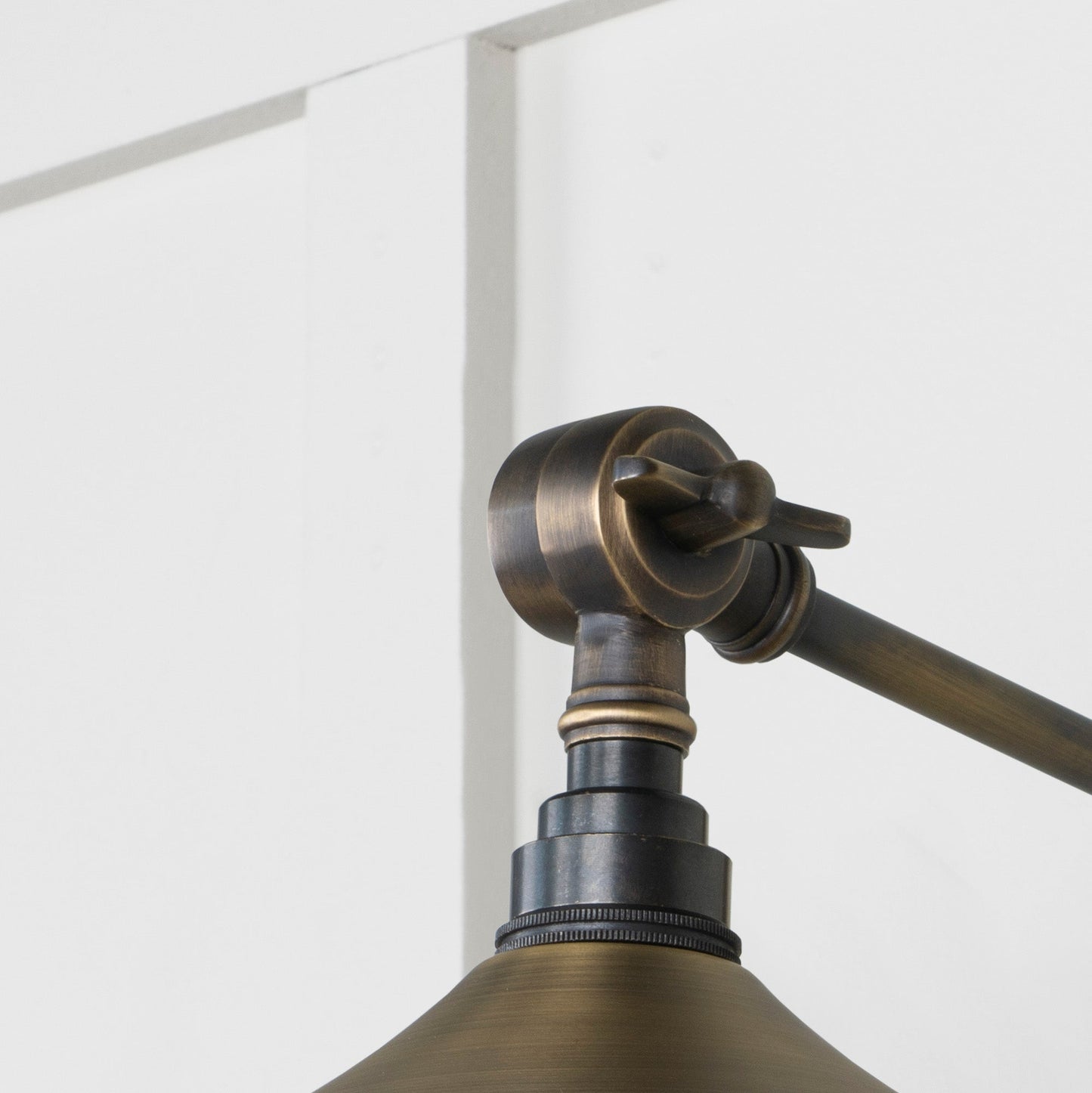 Aged Brass Flora Wall Light , Detailed close up view of pendant.