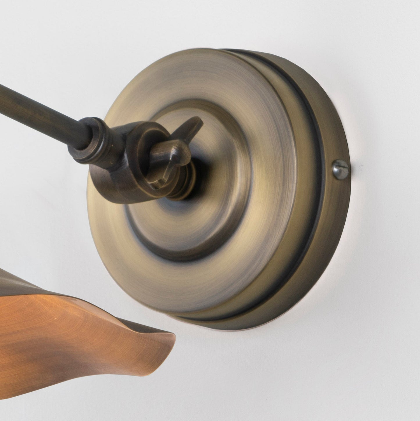 Aged Brass Flora Wall Light , close up view of fitting .