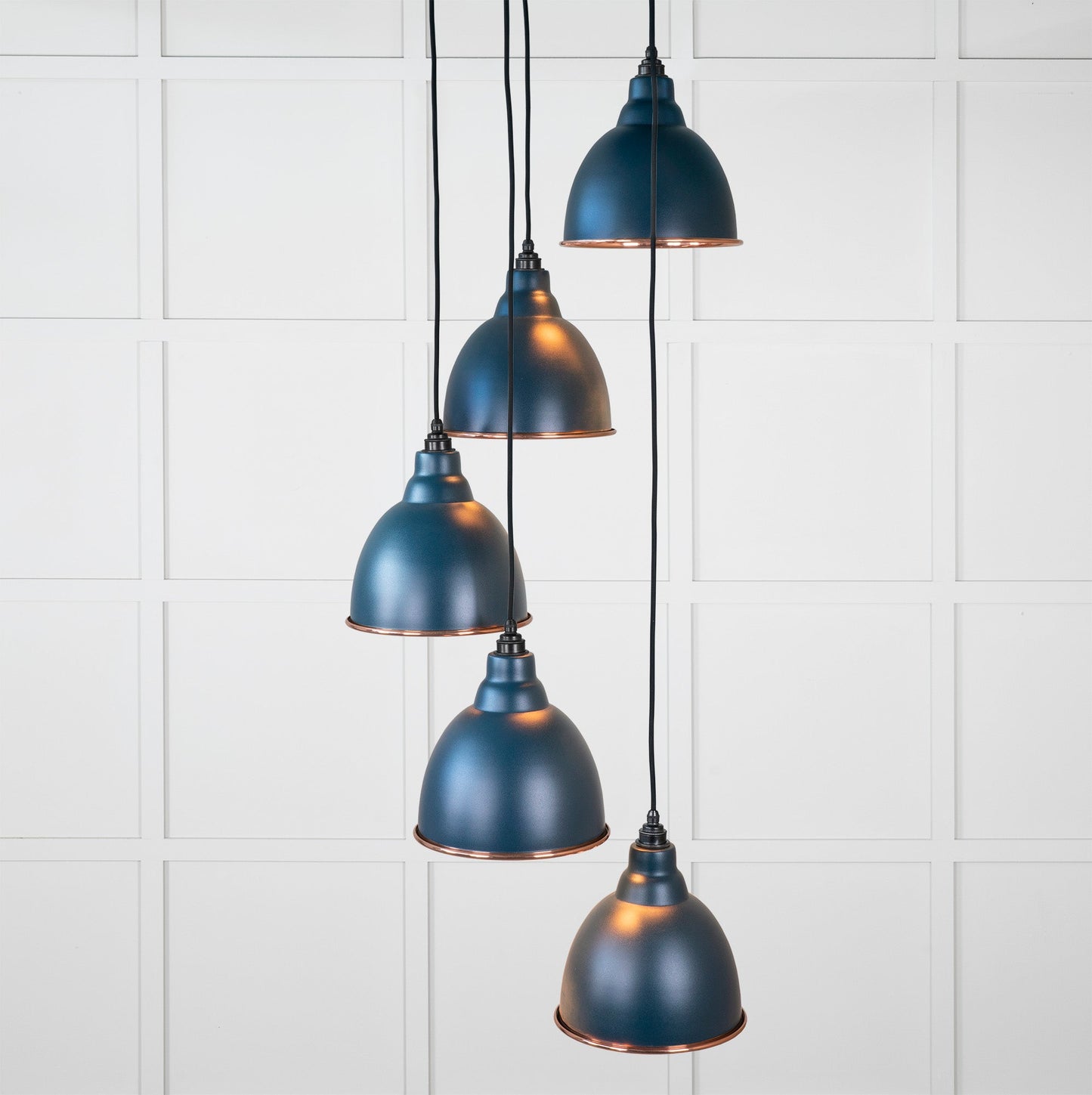 Hammered Copper Brindley Cluster Pendant Light Dusk, Front Side with light on.