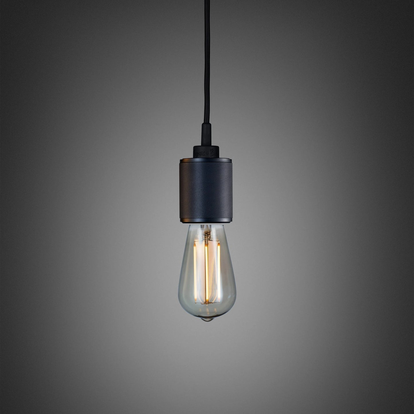 Heavy Metal Pendant light / Cross smoked bronze, front view.