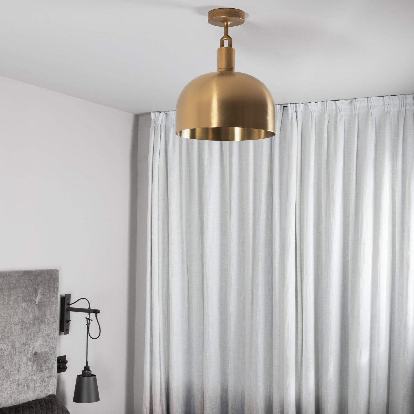 Forked Ceiling Light / Shade / Large brass, front view in bedroom setting.