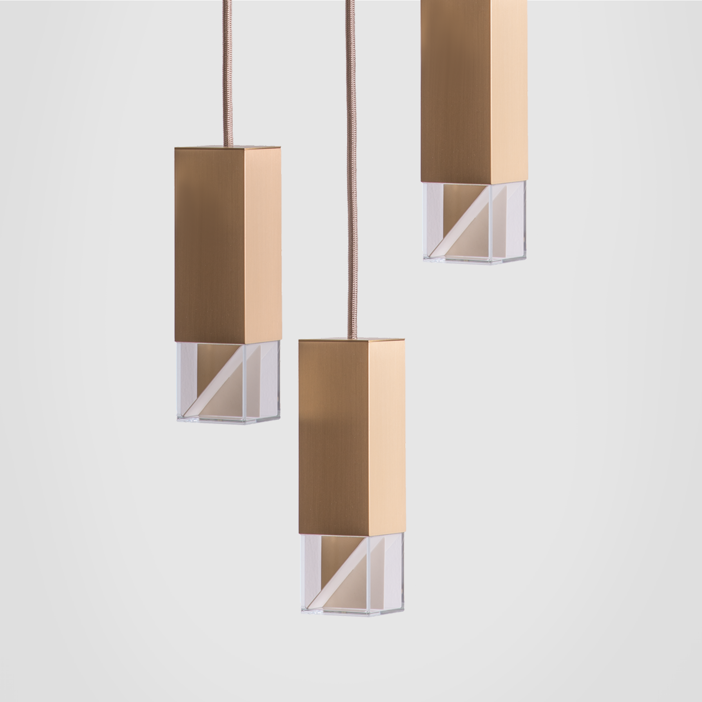 Lamp/ One Brass Trio Chandelier grey background close up