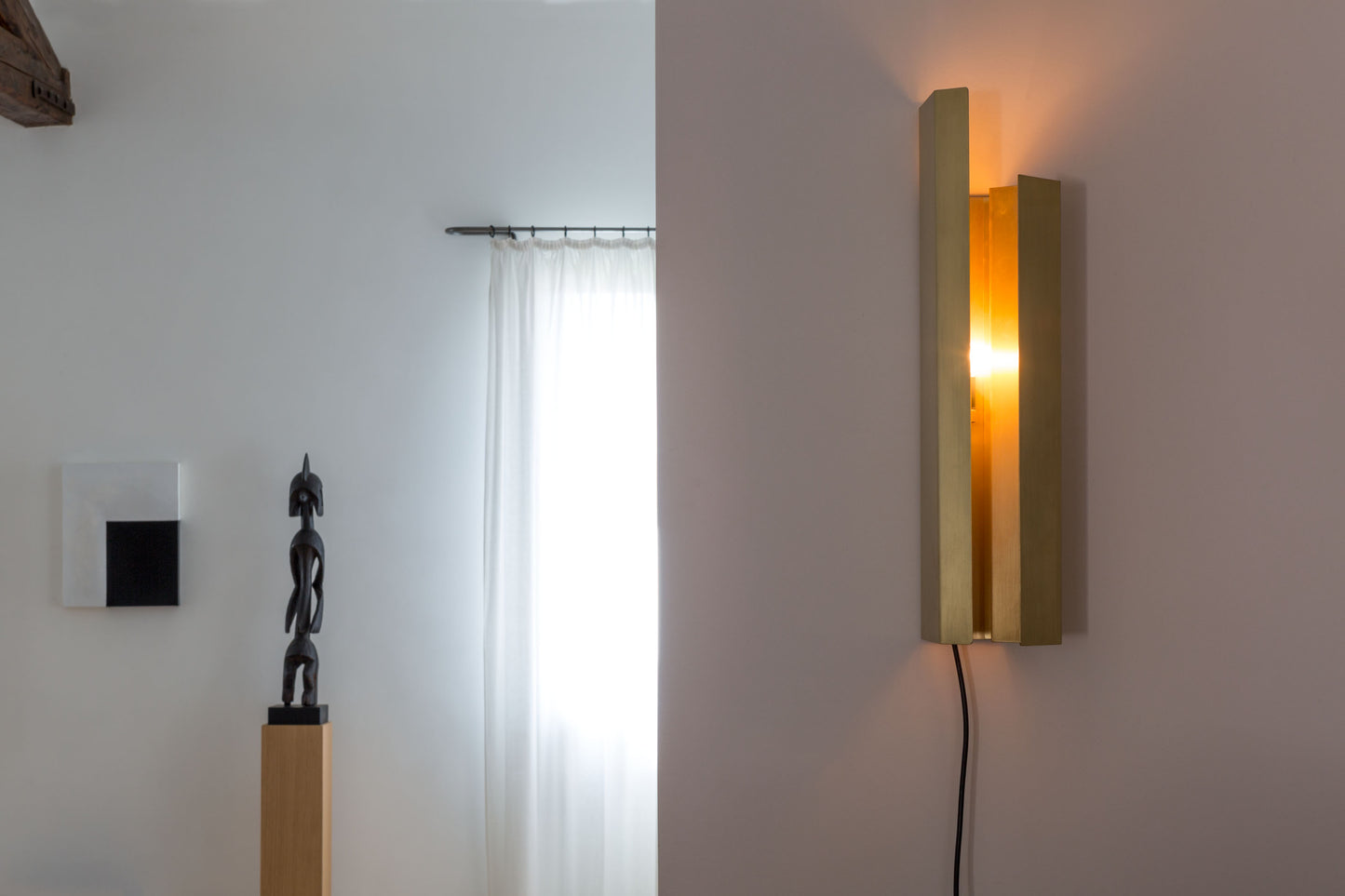 Piega Wall Light, in setting, on.