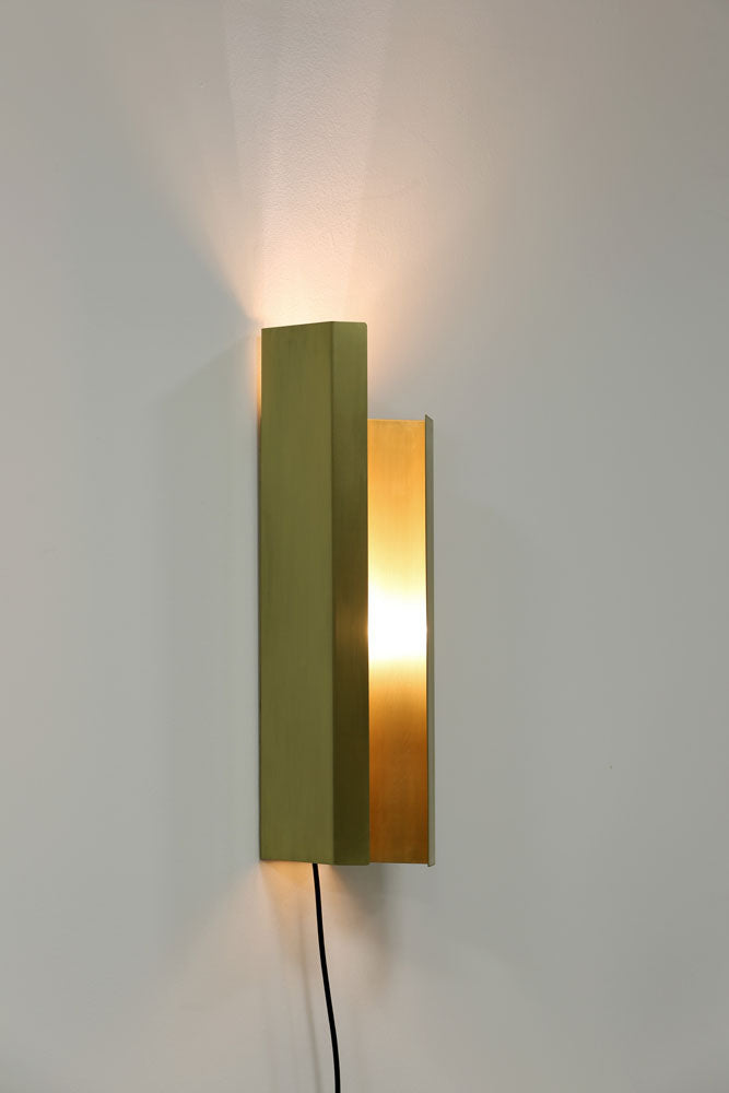 Piega Wall Light, front view, light on.