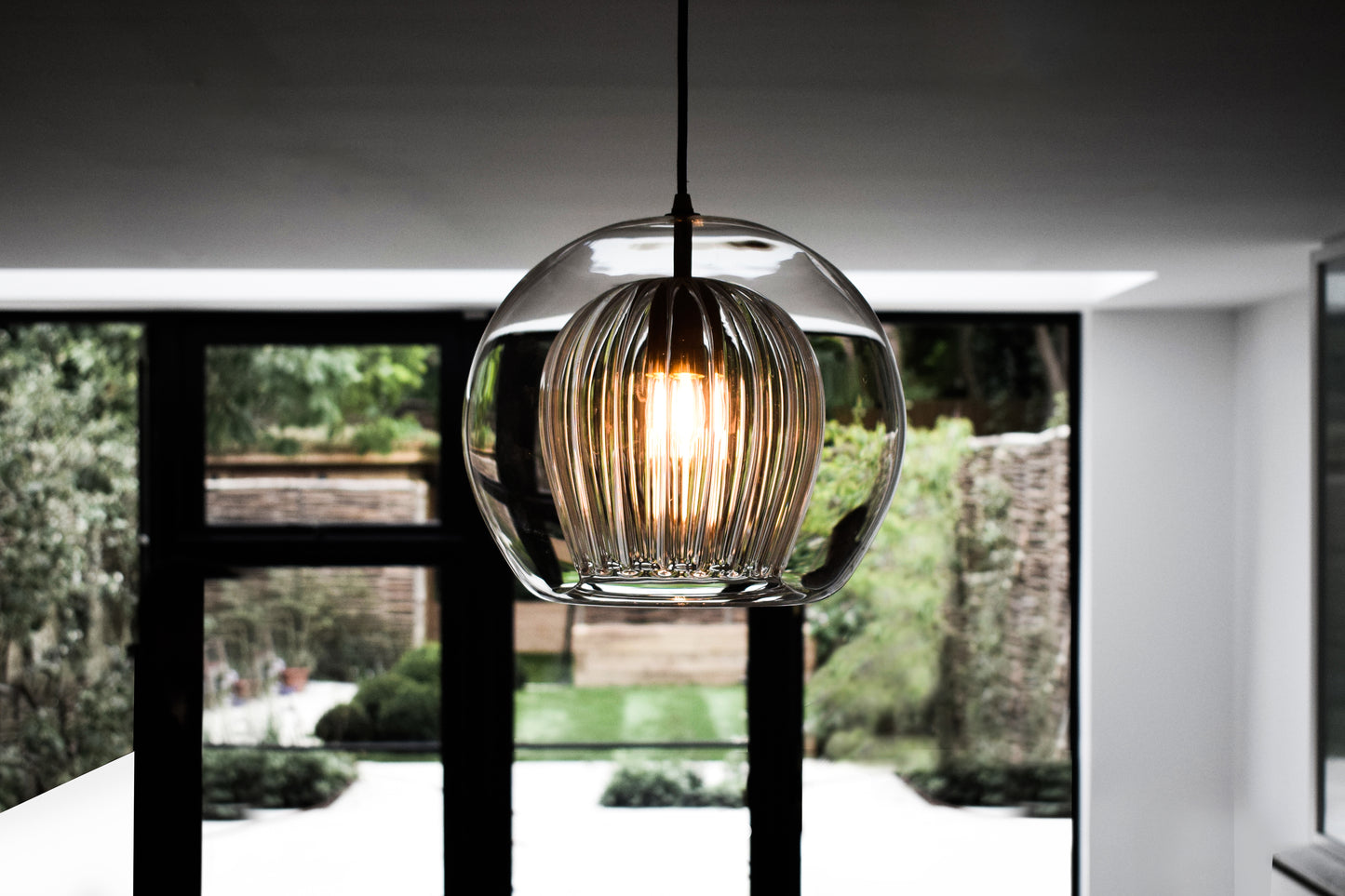 Pleated Crystal Pendant Light clear, close up view of pendant.