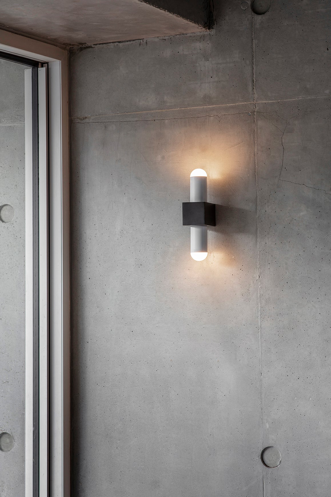 Block Wall Light, on wall in setting on.