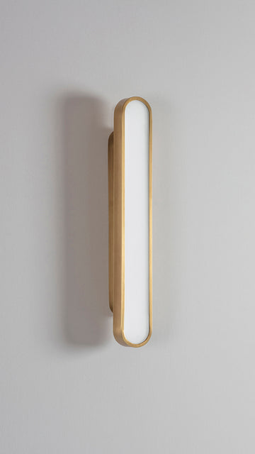 Capsule Wall Light brushed brass, front view.