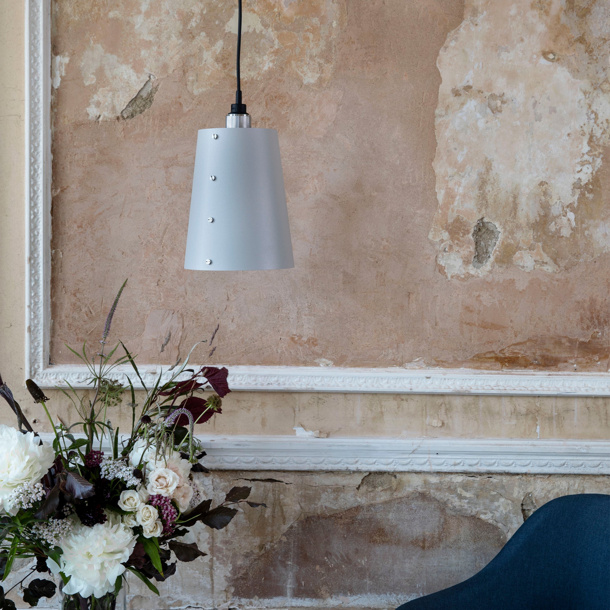 Hooked 1.0 Large Pendant Light / Stone Steel, in setting with background.