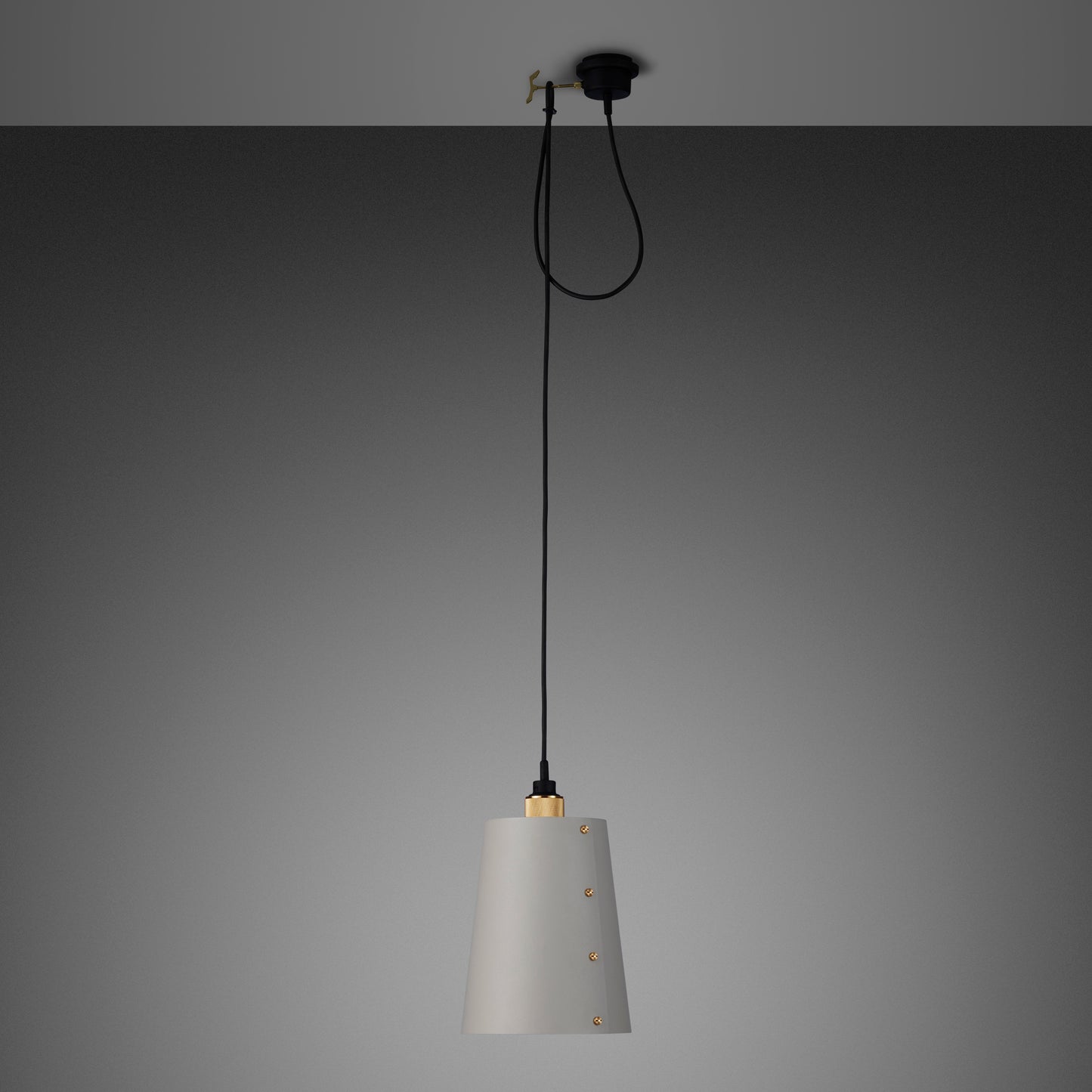 Hooked 1.0 Large Pendant Light / Stone brass, front view.
