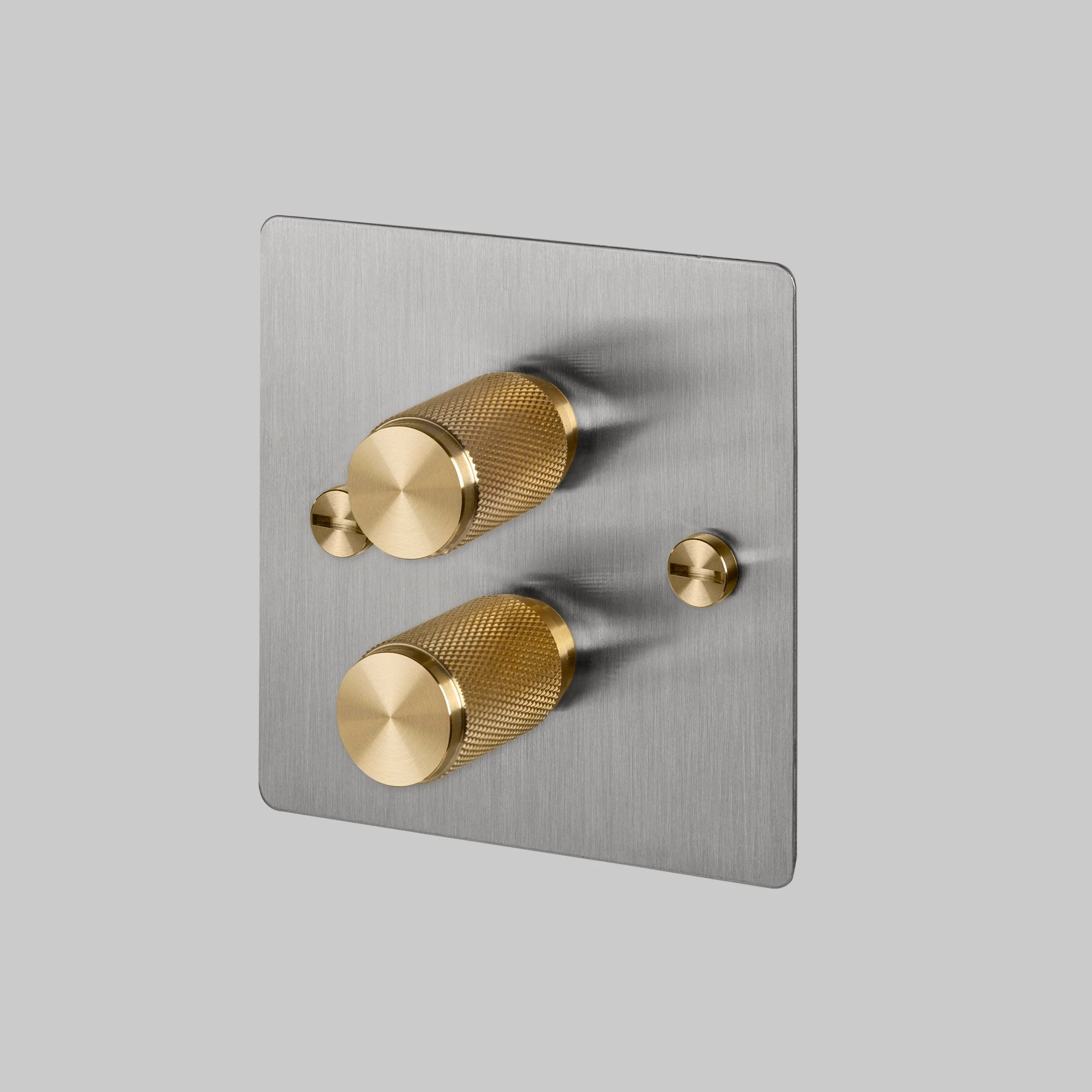 2G Dimmer/ 120W/ Steel with brass details, angled view.