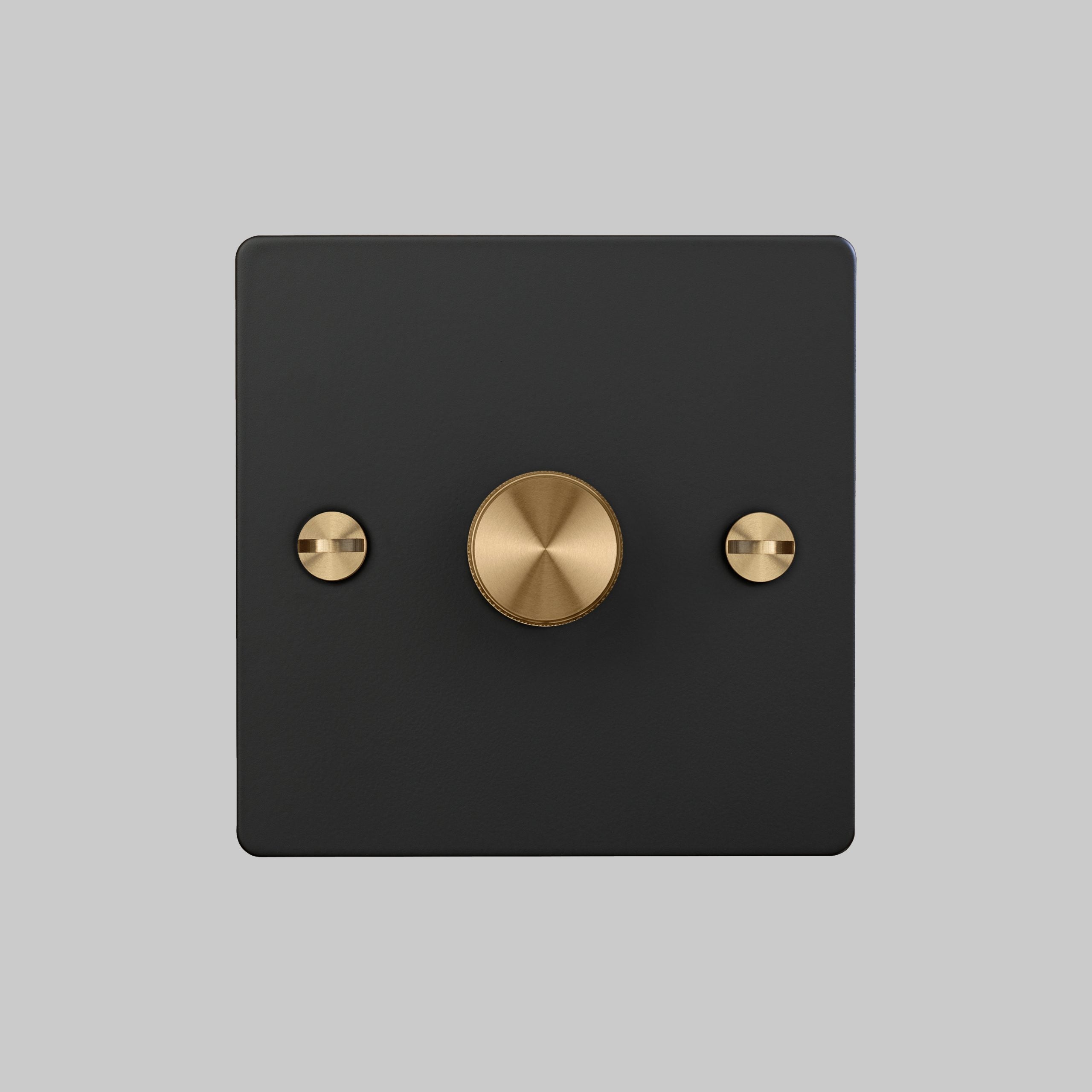 1G Dimmer/ 100W/ Black with brass details, front view.