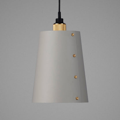 Hooked 1.0 Large Pendant Light / Stone brass, detailed close up of shade and knurling.