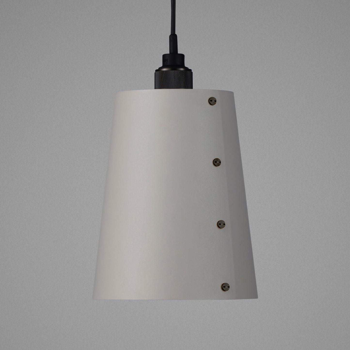 Hooked 1.0 Large Pendant Light / Stone smoked bronze, detailed close up of shade and knurling.