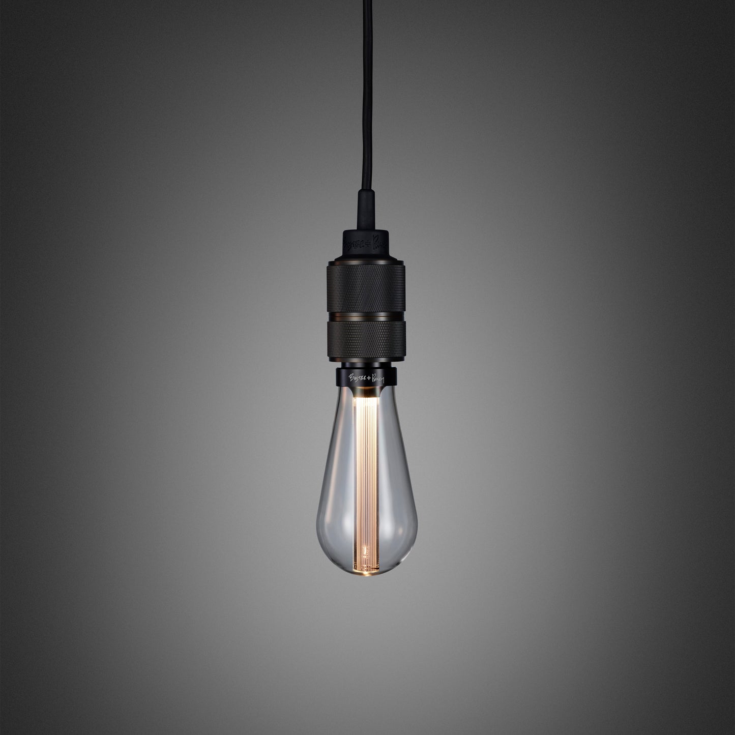 Hooked 1.0 Pendant Light / Nude Smoked bronze, close up view of bulb.