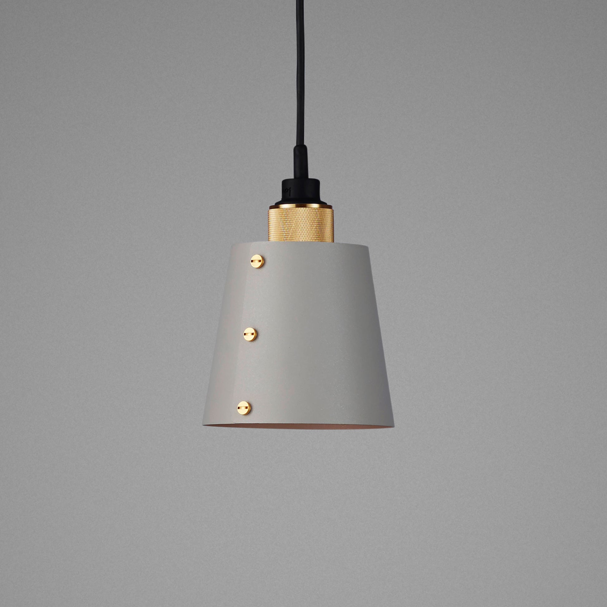 Hooked 1.0 Small Pendant Light / Stone Brass, detailed close up of shade and knurling.