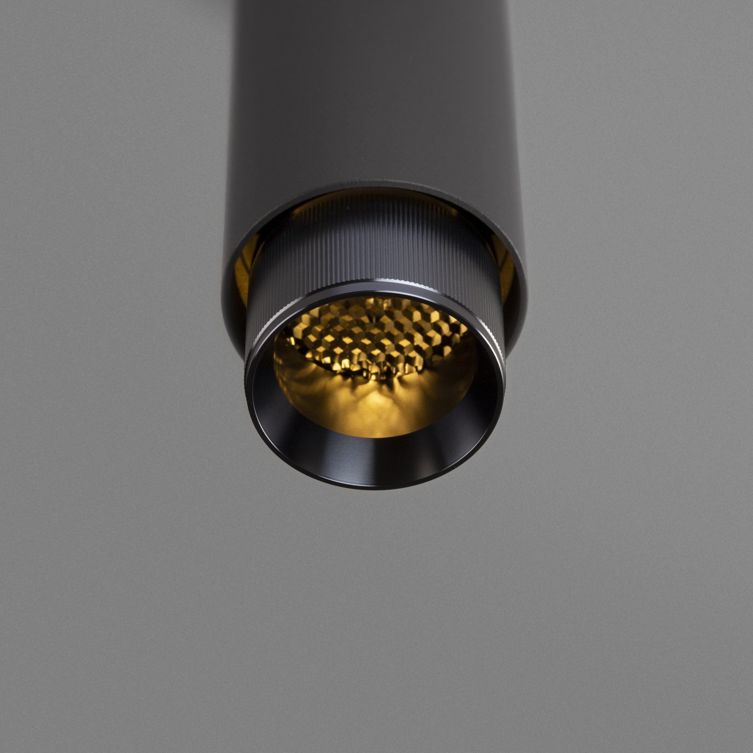 Exhaust Pendant Light / Linear / Graphite Gun Metal, detailed close up view of kurling and light.