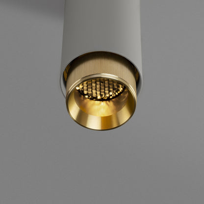 Exhaust Pendant Light / Linear / Stone Brass, detailed close up view from upneath of knurling and light.