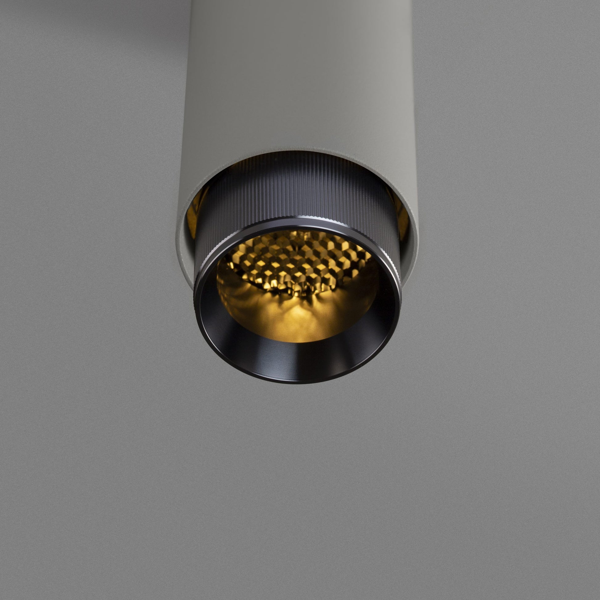 Exhaust Pendant Light / Linear / Stone Gun metal, detailed close up view from upneath of knurling and light.