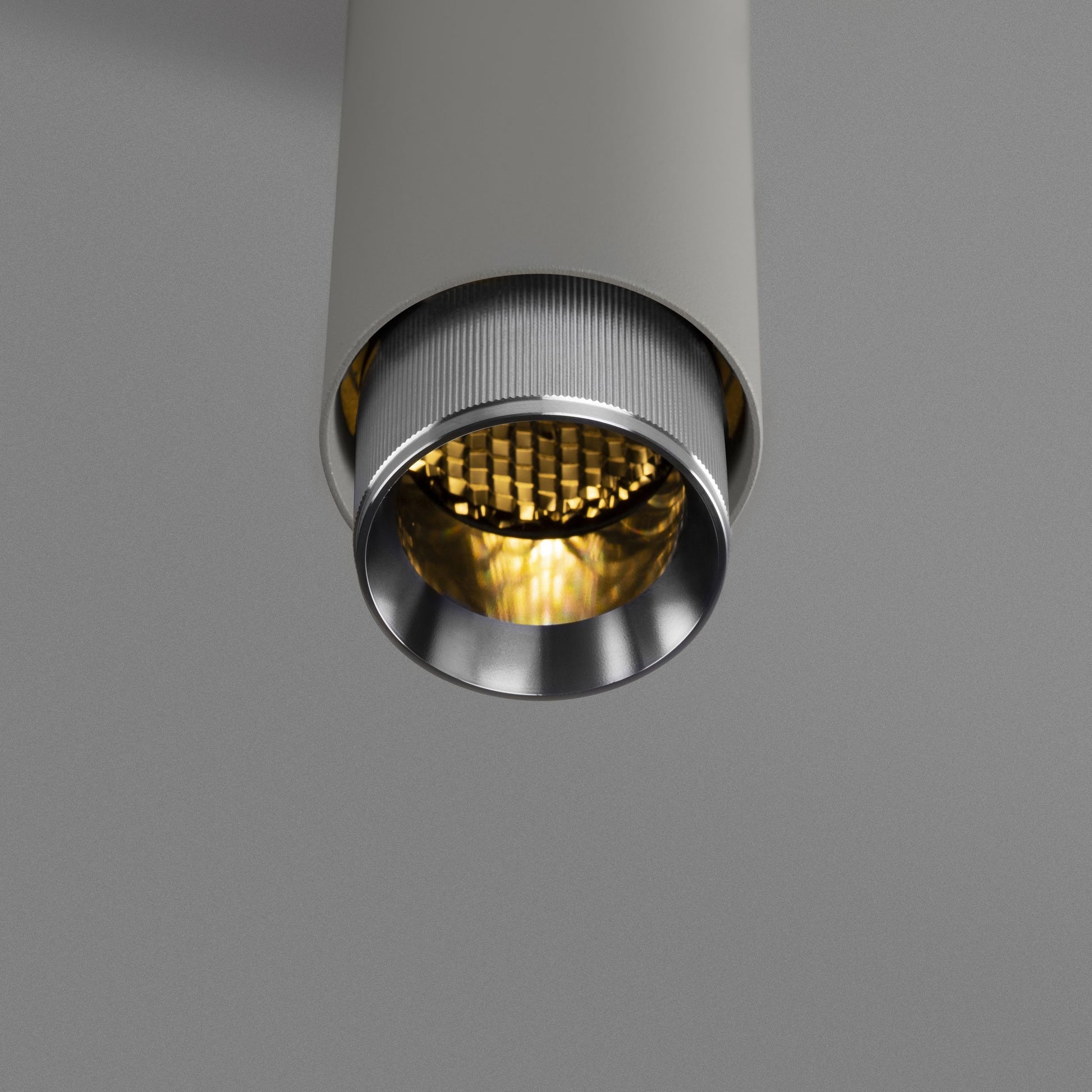 Exhaust Pendant Light / Linear / Stone Steel, detailed close up view from upneath of knurling and light.
