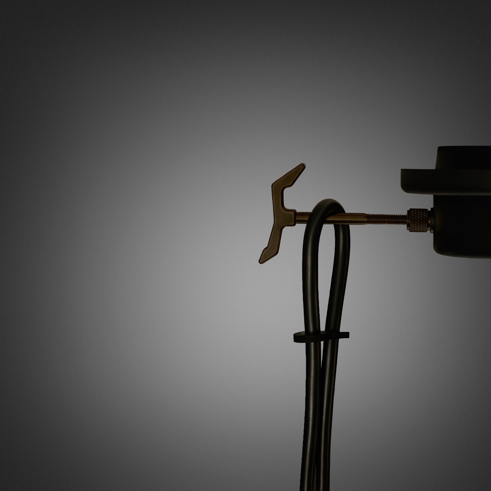 Hooked 1.0 Small Pendant Light / Stone smoked bronze, detailed close up of hook and cable.