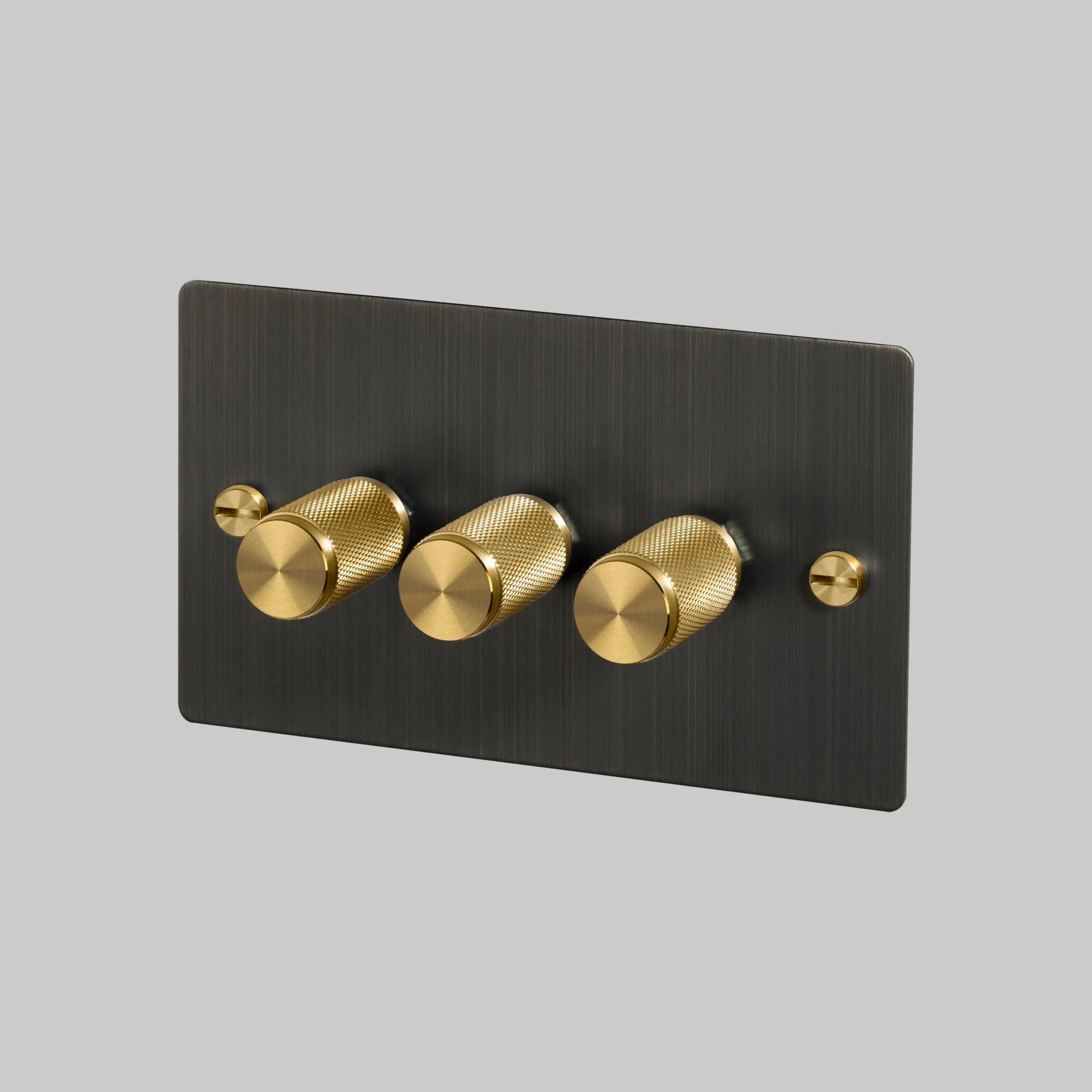3G Dimmer/ 100W/ Smoked Bronze with brass details, angled view.