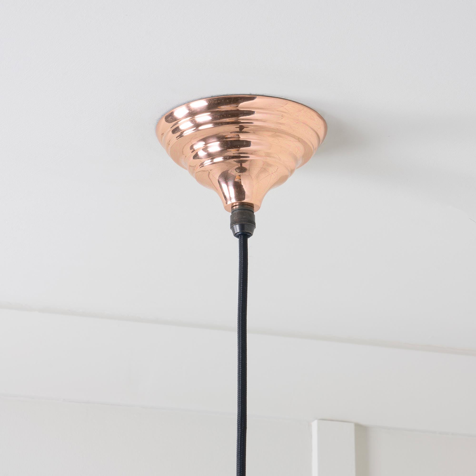 Hammered Copper Brindley Pendant Light Copper, close up view of fitting and cable.
