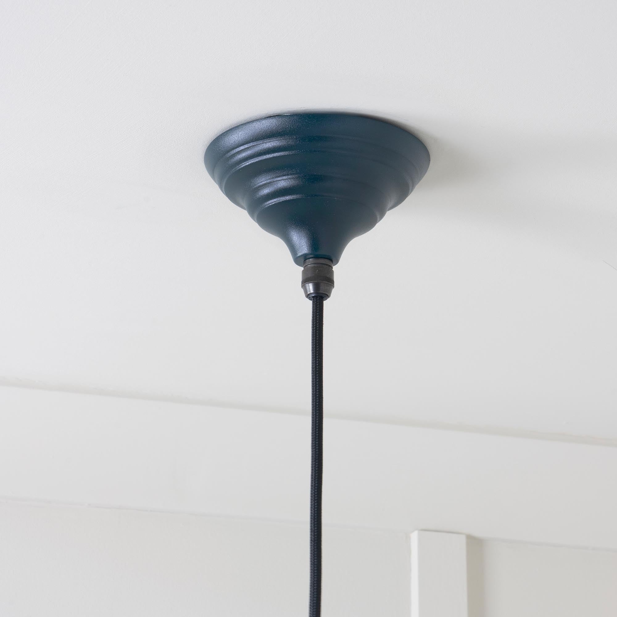 Smooth Brass Hockley Pendant Light Dusk, close up view of fitting and cable.