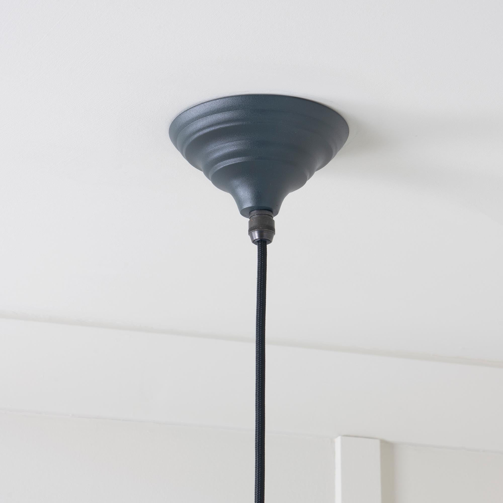 Smooth Brass Hockley Pendant Light Soot, close up view of fitting and cable.