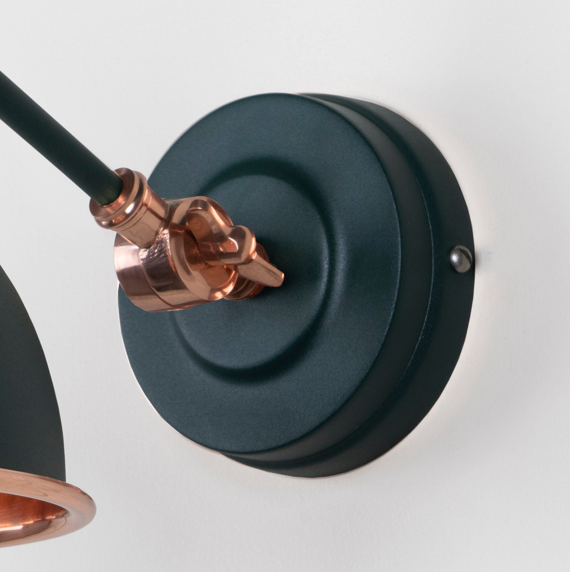 Smooth Copper Brindley Wall Light Dingle, close up view of fitting and cable.